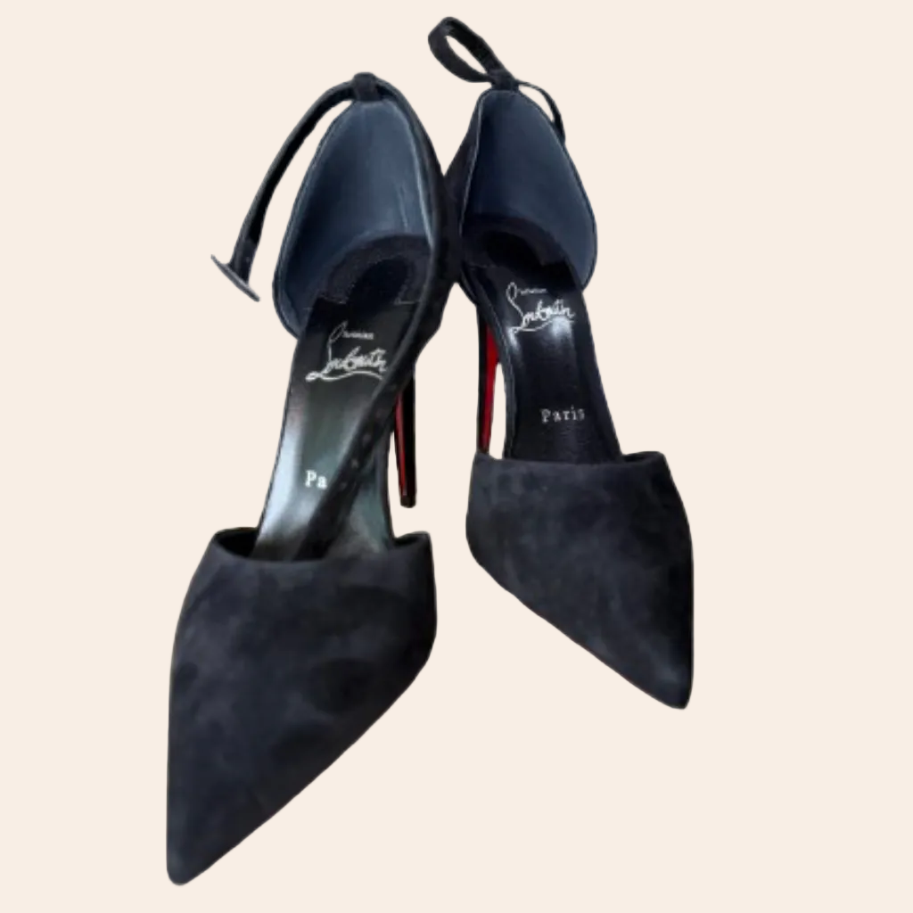 Christian Louboutin Astrida Bride 100 pumps in black suede with a signature red sole.