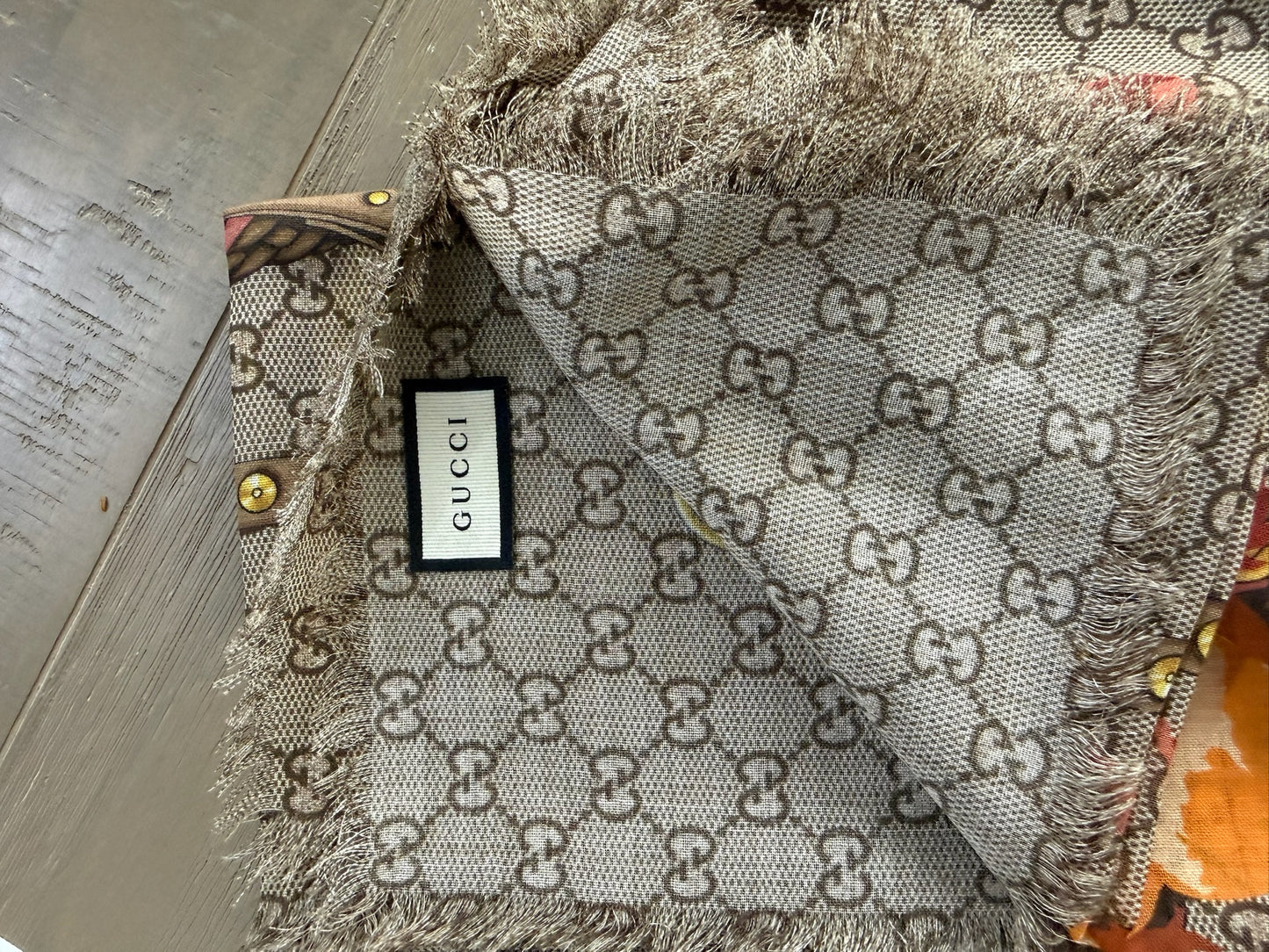Gucci grey scarf with logo weave and sunflower floral print