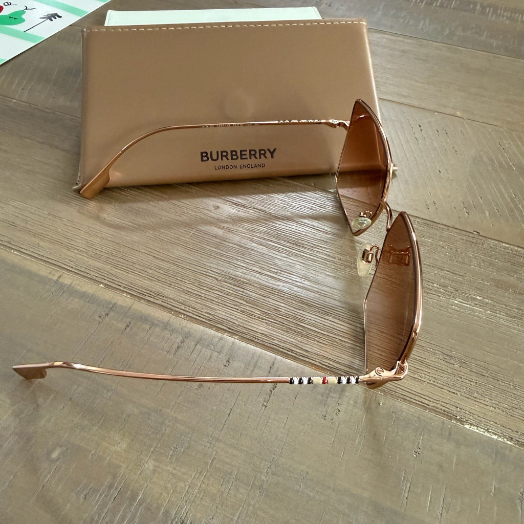 Burberry brown tinted hexagonal sunglasses with rose gold frames